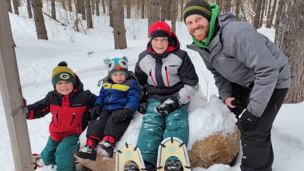 Family snowshoeing at WinMan