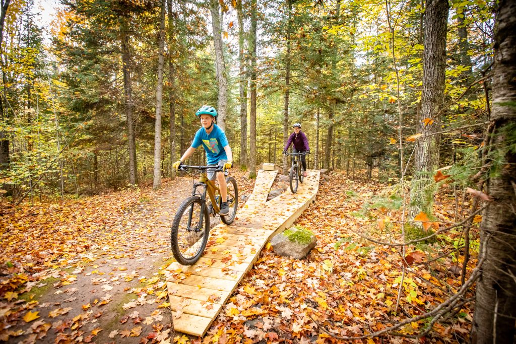 Mother and son riding together on Scout Trail