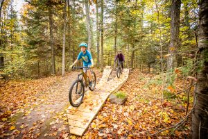 Mother and son riding together on Scout Trail