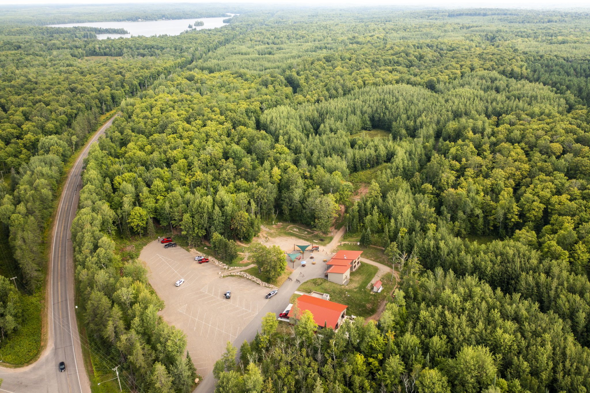 Drone shot over Drone shot showing main trailhead and land to the North