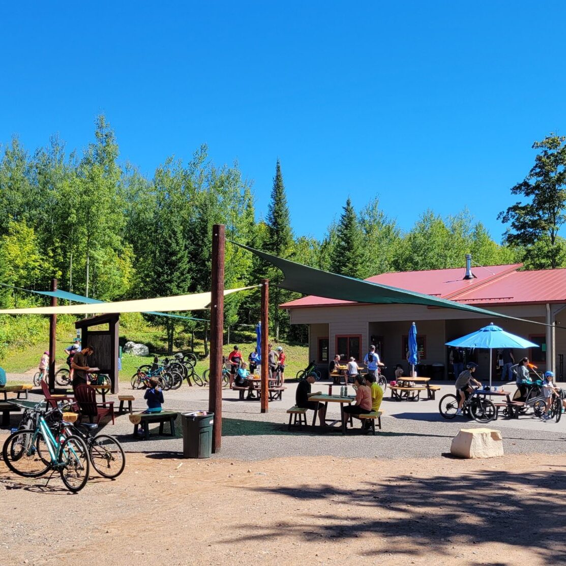 People enjoying WinMan Park at WinMan